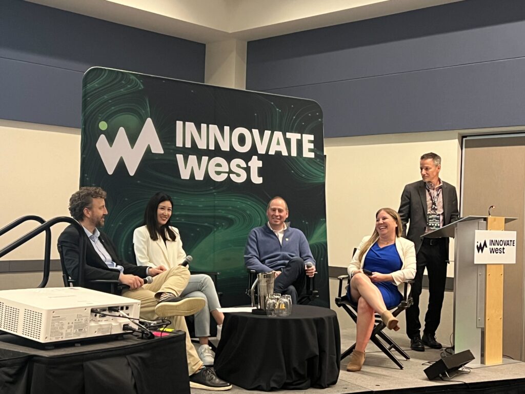 Panel of finance experts at InnovateWest 2024 discussing the recent Budget 2024 announcement.