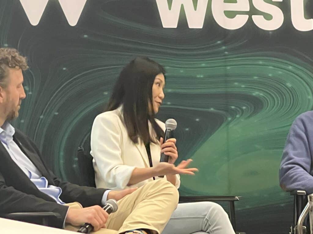 Miriam Dong from Boast AI joining Panel of finance experts at InnovateWest 2024 discussing the recent Budget 2024 announcement.